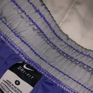 Purple Nike shorts